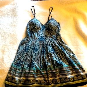 American Rag dress graceful fabric with geometric eastern design in navy blue.